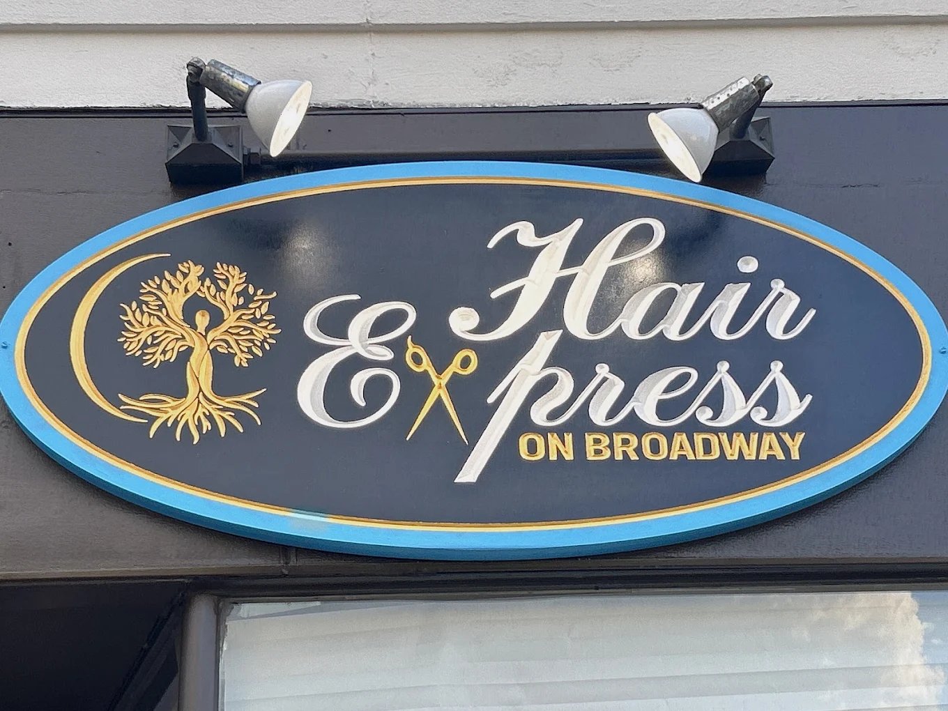 Hair Express on Broadway carved sign