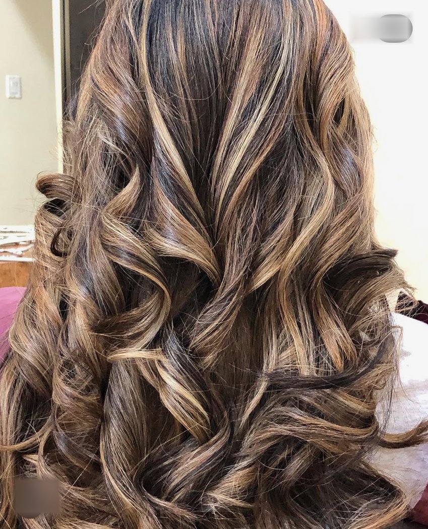 Caramel balayage curls styled in Tarrytown, NY